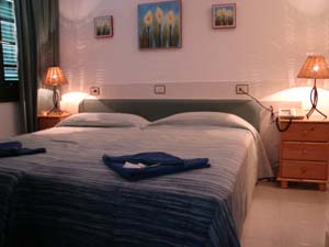 Family 2 room twin and 2 children with pool view, terrace, an extra bed, private facilities (bath and shower), and breakfast